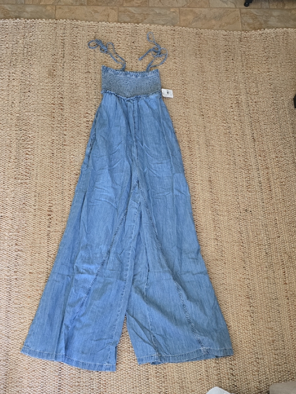 We The Free smocked tie-strap denim jumpsuit with wide-leg pants